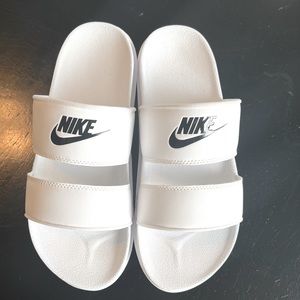 Nike- White Women’s Slides